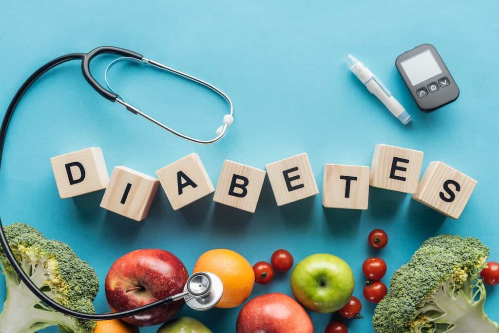 Concepto de prevención de la diabetes con estetoscopio y letras