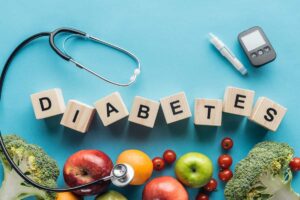 Concepto de prevención de la diabetes con estetoscopio y letras