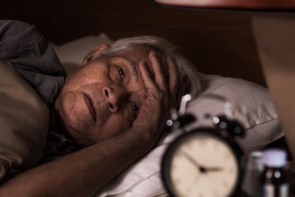 senior-man-lying-awake-in-bed-at-night-2026-01-07-06-13-09-utc